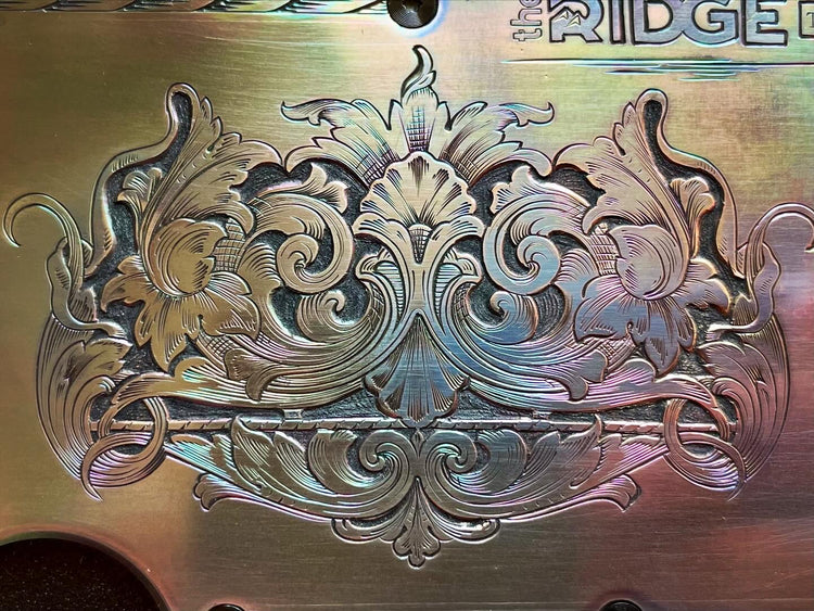 Hand engraved titanium front and back plates for The Ridge wallet
