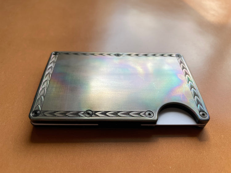 Hand engraved titanium front and back plates for The Ridge wallet